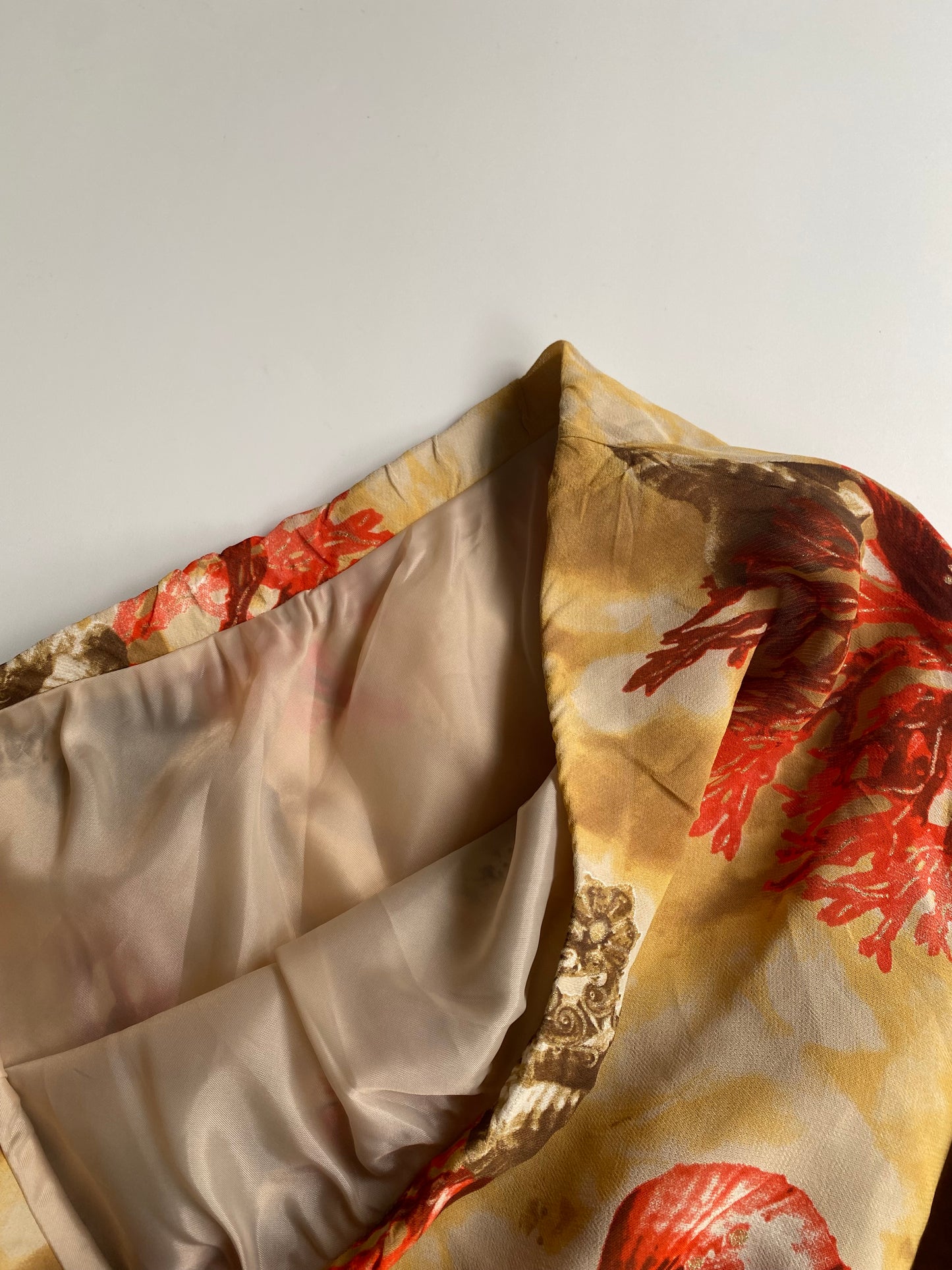 Asymmetrical shell skirt