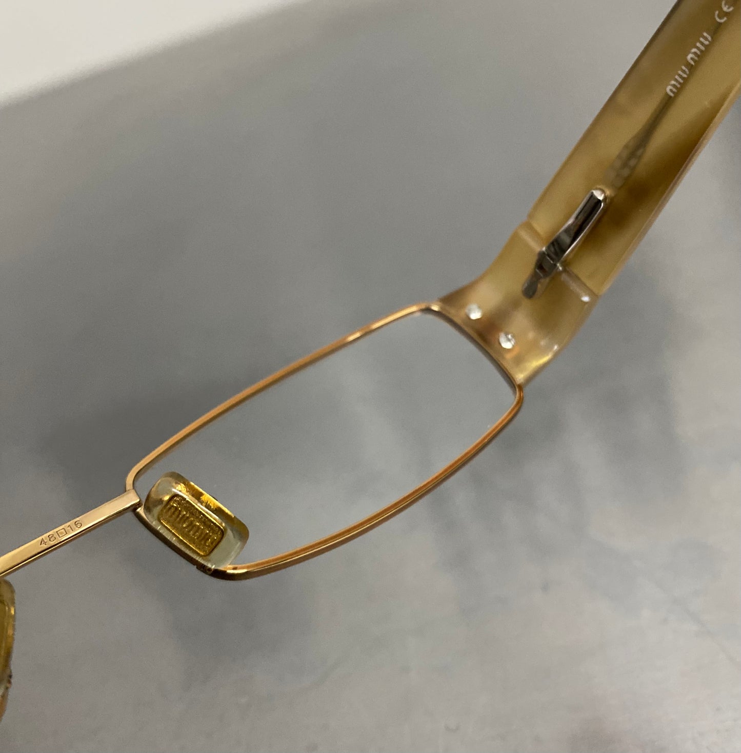 Miu Miu VMU63E/7OE-1O1 glasses