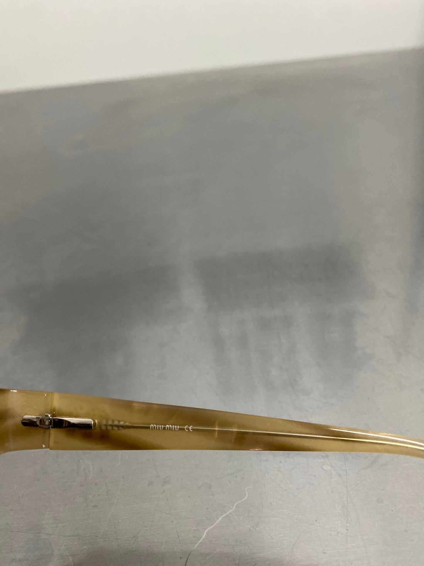 Miu Miu VMU63E/7OE-1O1 glasses