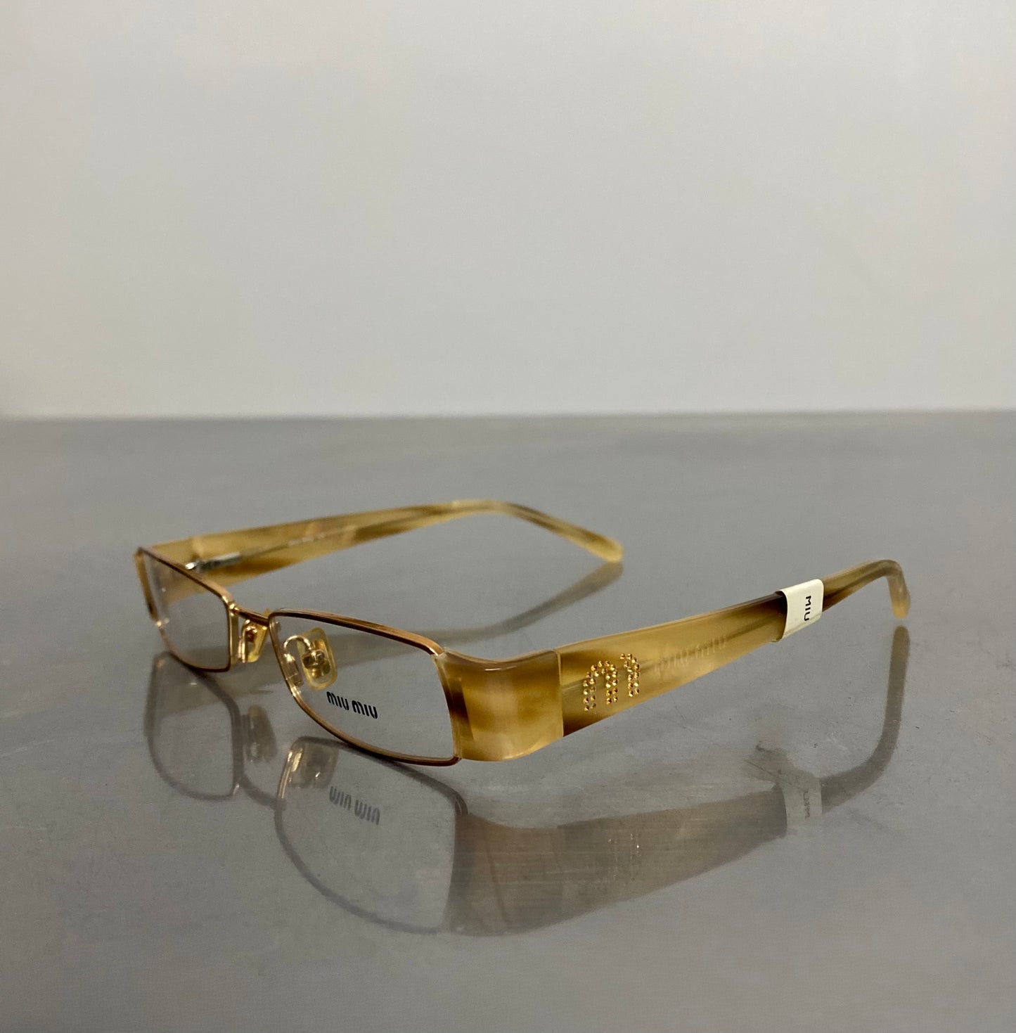 Miu Miu VMU63E/7OE-1O1 glasses