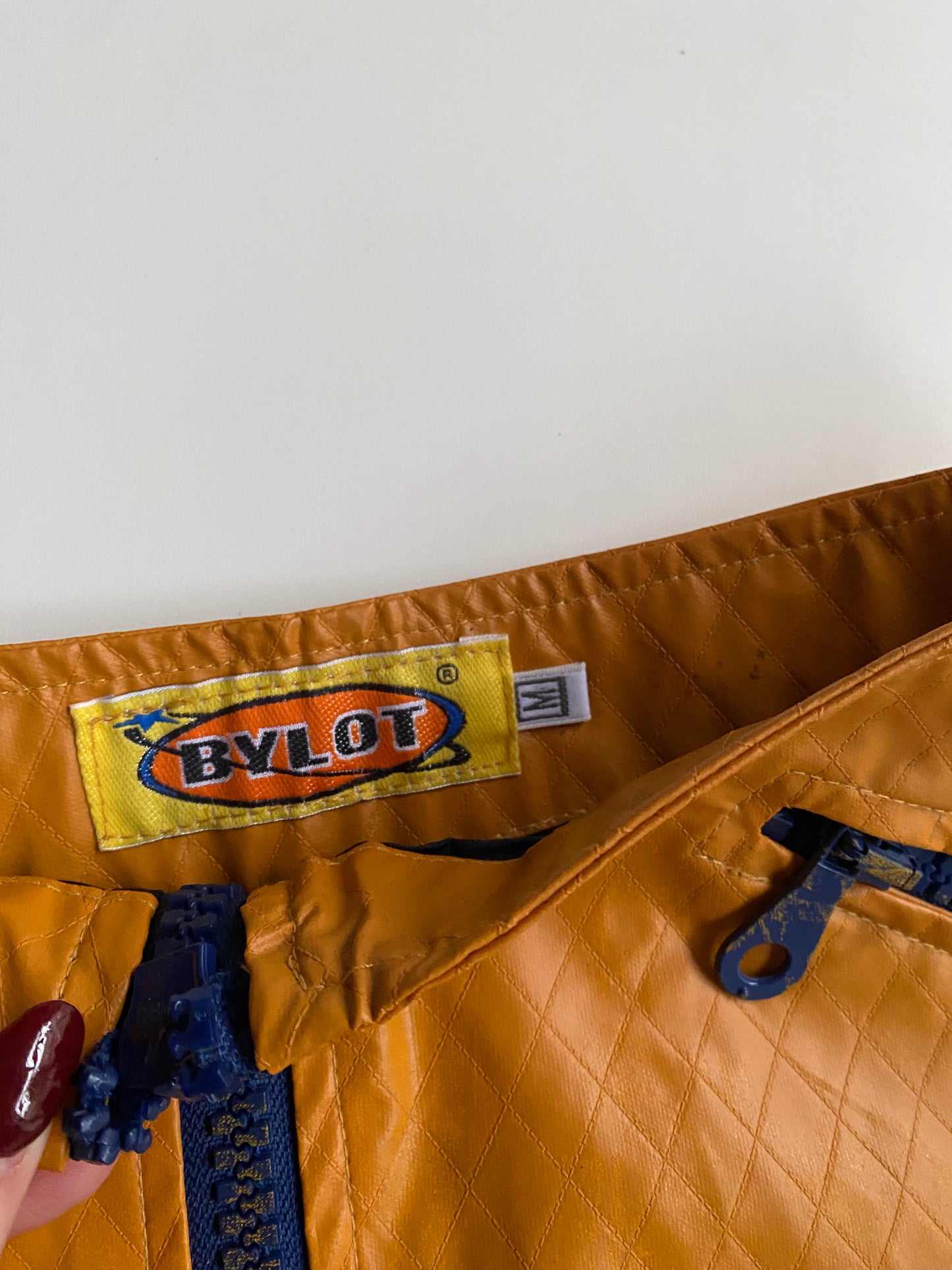 Bylot orange faux leather skirt