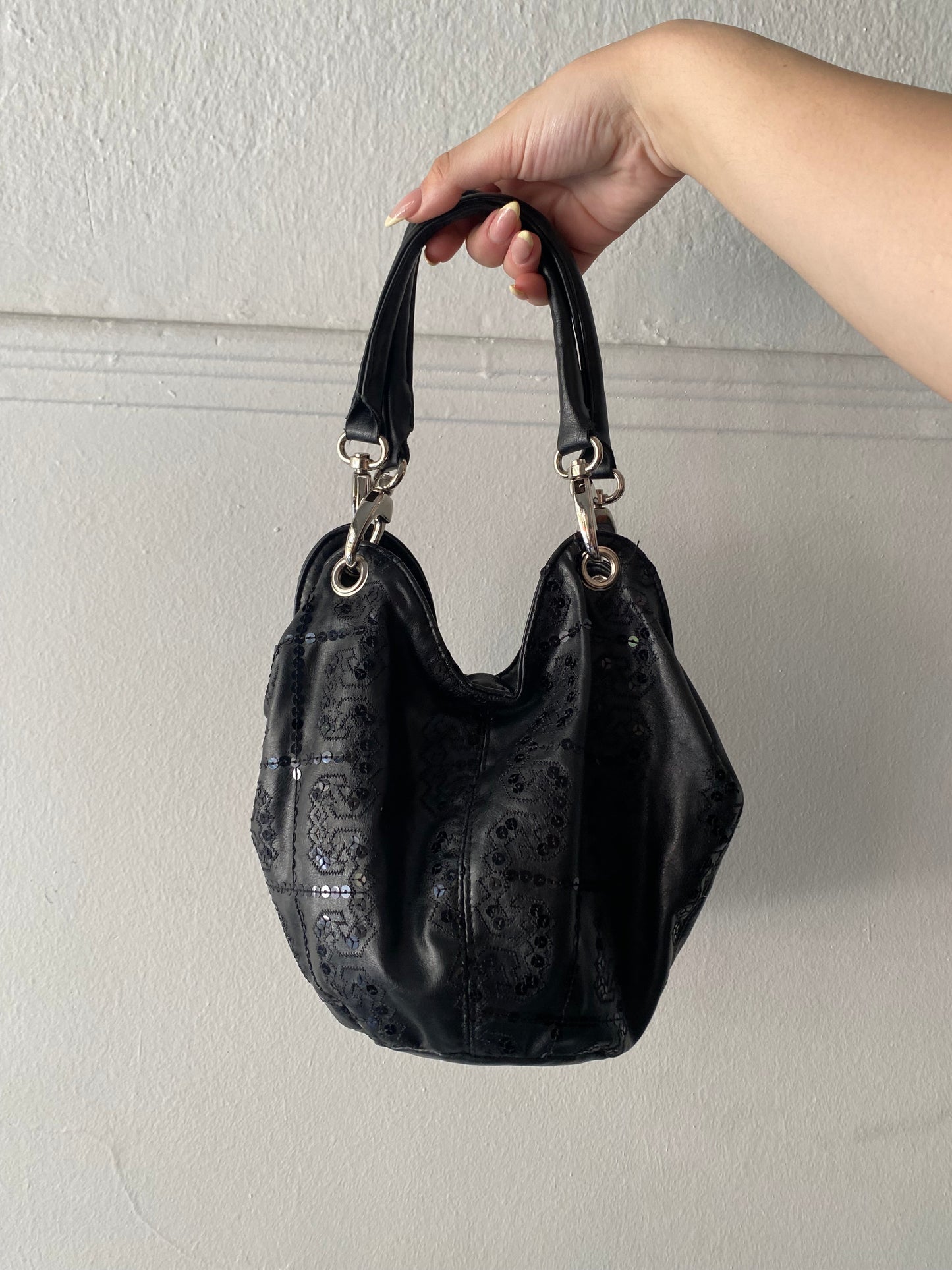 Black sequin hand bag