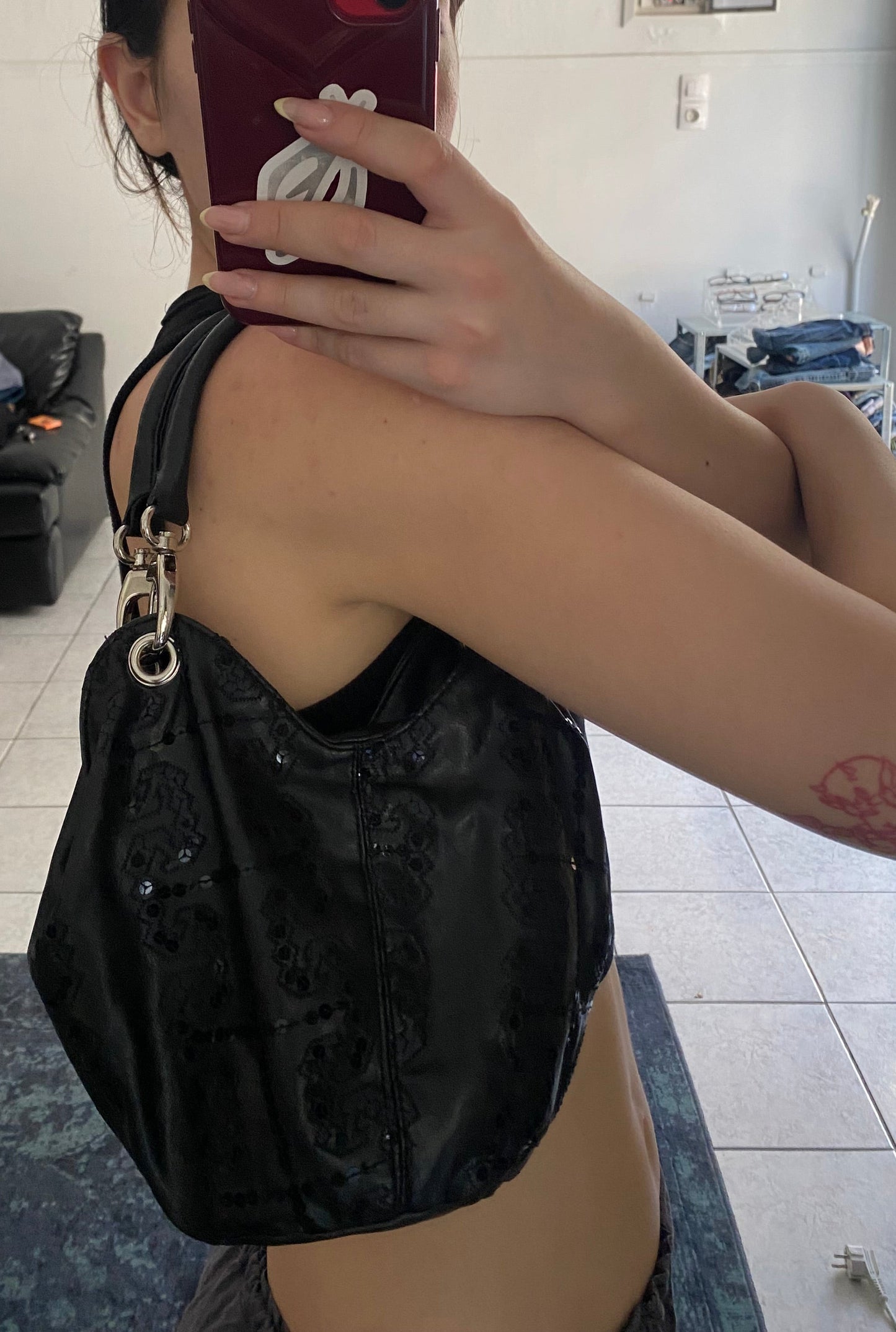 Black sequin hand bag