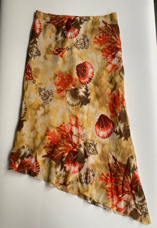 Asymmetrical shell skirt